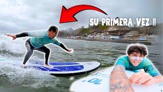 WE TOOK A STRANGER SURFING FOR THE FIRST TIME!!