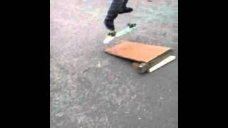 Anthony Velazquez is kick flipping this homemade ramp