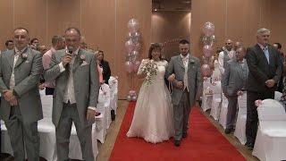 Groom Sings Elvis Number as Bride Walks up Aisle!