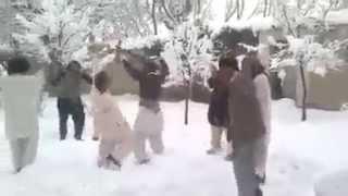 Afghan dance  attan in snow