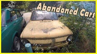 Creepy Abandoned Russian Cars in Yard. Abandoned ZAZ 968M and VAZ (LADA) 2103. Cars of the 1990s