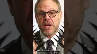 Chef Alton Brown reviewed a pair of meat shredders: "You can't do this with a fork"