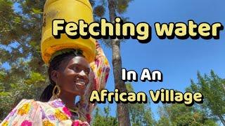 Where and how we FETCH WATER  in this African Ugandan Village