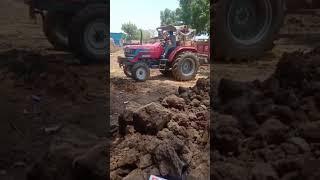 MAHINDRA ARJUN NOVO TRACTORS with HEAVY RAJ Trolley in mati