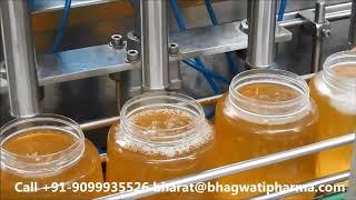 Ghee Bottle Automatic Four Head Piston Filling Machine (Servo Model)