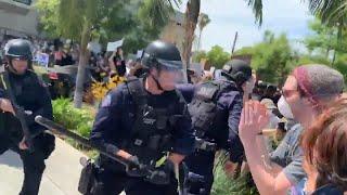 LAPD officer beats protesters with baton during George Floyd protest