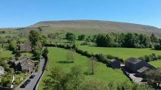 View from the air of Downham village in the Ribble Valley - drone footage using the DJI Spark