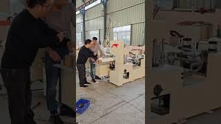 Napkin paper folding and making machine