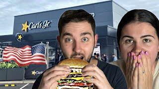 Brits try Carls Jr. for the first time!