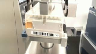 PlateCrane Robotic Arm Handling Lidded Matrix Tube Racks - Lab Automation