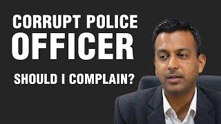 Should I complain against a corrupt police officer in my case?