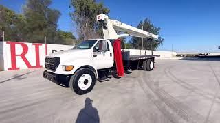 Grua Titan Terex BT3063B para 15 toneladas sobre camión Ford F750 2003