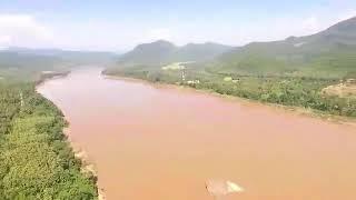 Lush green mountains by the great Mekong River