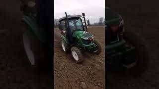 Tavol brand 70hp farm tractor working on the european farm land.