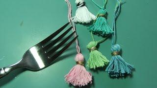 Tiny tassels made with a fork???? huh??