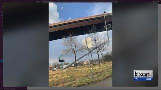 DURING & AFTER: KXAN camera captures tornado toppling metal poll