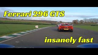 Cayman 987 2.7 vs Ferrari 296 GTS on track at Goodwood 