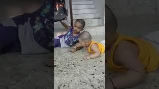 baby ayaan trying to bite his brother's hand️