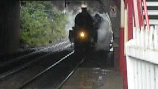 Steam train passes through Davenport Railway Station ....