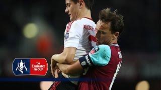 Mark Noble carries Ander Herrera off the pitch | Snapshots