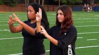 "It does my heart good." Students sign national anthem for Deaf Awareness Month