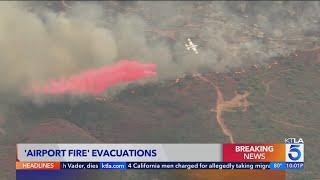 'Airport Fire' in Orange County explodes in size, forces evacuations