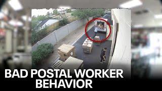 Postal worker caught on camera behaving badly