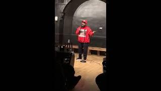 Comedian Baldhead phillips doing a set