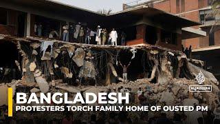 Bangladesh protesters torch family home of ousted PM Sheikh Hasina