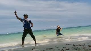 Dancing with my cousin in Teluk Segadas, Pangkor Island, Perak, Malaysia