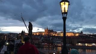 Lamplighter (lampář) on the Charles Bridge, Prague