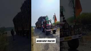 Arjun Novo Tractor with heavy loaded sugarcane Trolley on Road