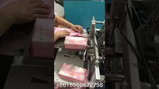 Semi auto diapers and women pads packaging machine cheap price in China factory