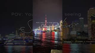 This is what the view looks like from the Shanghai bund at night-  vibrantly illuminated with colors