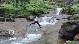 Epic Slow Motion Plunge in Front of Magnificent Waterfall