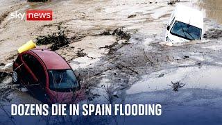 At least 52 people dead after flash floods hit Spain