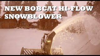 New Bobcat SB-32 x 68" Hi-Flow snowblower making quick work of a residential driveway.