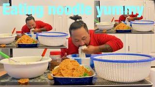 Eating noodles