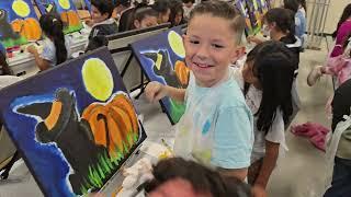 Eric White Elementary 3rd and 4th grade painting the Cat n Pumpkin