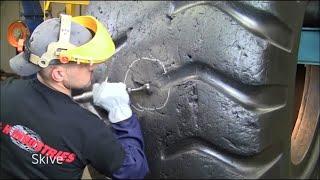 Quick replacement of car tires with machinery, giant tractor tire repair repair patch