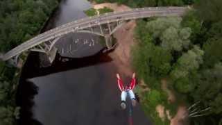 Bungee jumps from cable car in Sigulda