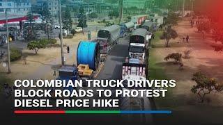 Colombian truck drivers block roads to protest diesel price hike | ABS-CBN News