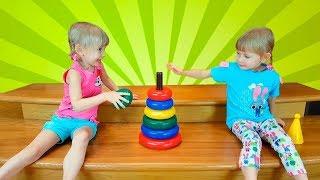 Alena and Pasha play with color toys