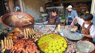 Hamazhe Yi Township Food Street 中國雲南昆明逛哈馬者彝鄉美食街，烤玉米，竹筒飯，羊湯鍋，炸洋芋，火燒牛乾巴，松毛烤雞烤豆腐等各種民俗美食，滿滿的煙火氣