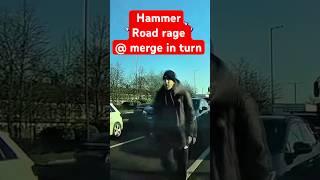 Hammer wielding road rage at a merge in turn merging lanes point in the road caught on dashcam.