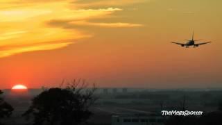 Landing of plane at  sundown sunset with amazing Full-HD colors (1080p)