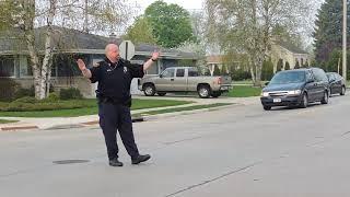 Sheboygan Police directing traffic at South 18th Street & Washington Avenue