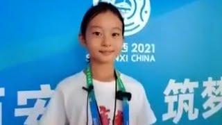 9-year-old skateboarder Zheng Haohao has fun attending National Games