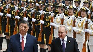 Russia and China in Central Asia: Compete, Cooperate, or De-conflict?