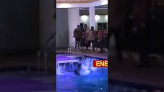 Artist fall into pool whiles on stage 